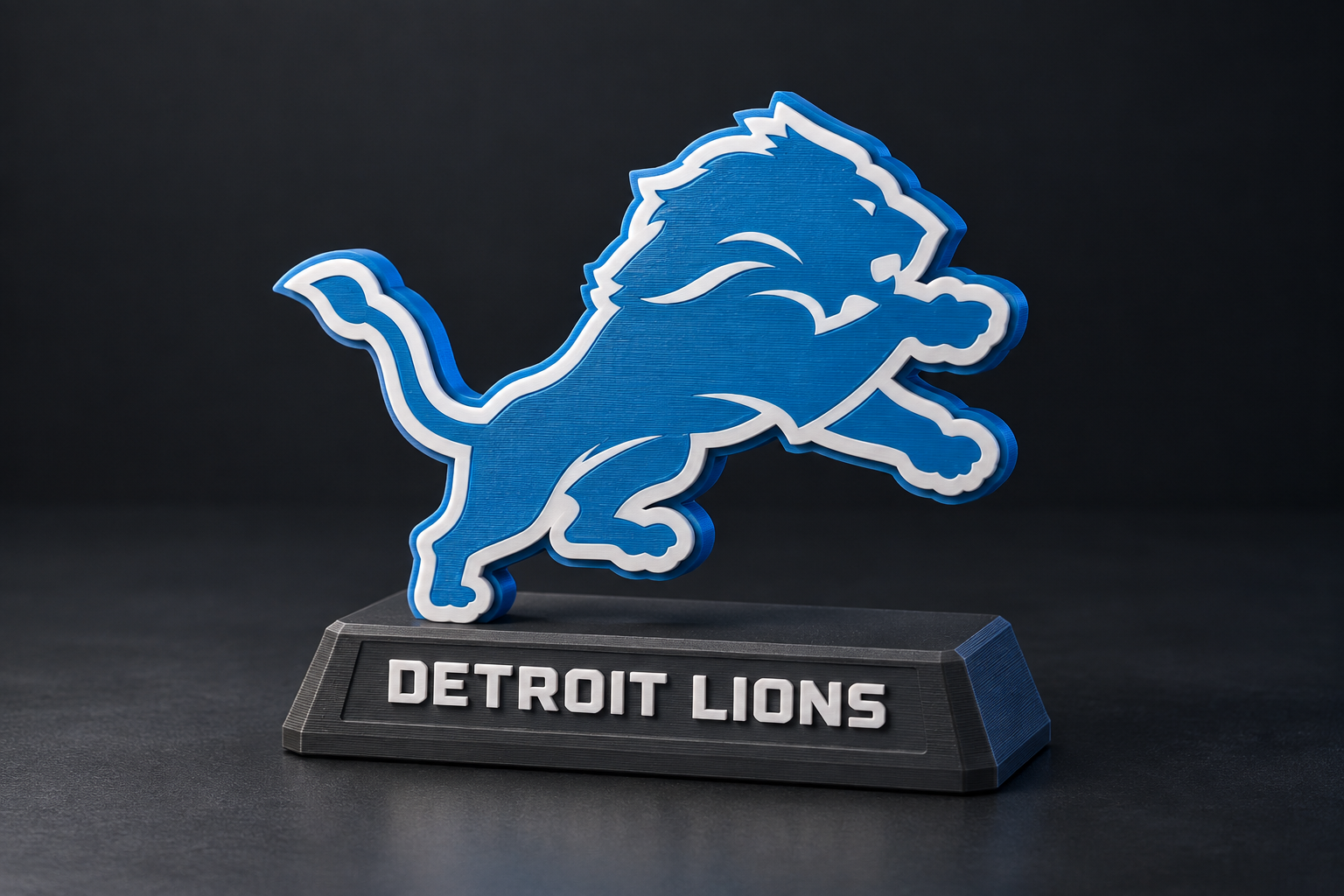 Detroit Lions desktop trophy concept with a blue dimensional lion on a black pedestal.